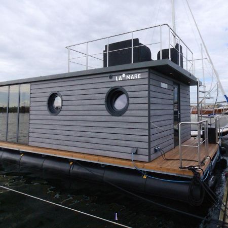 Hausboot Fjord Lacerta Mit Dachterrasse In Wendtorf Exteriör bild